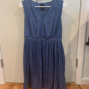 Silk Vera Wang dress worn once with side pockets.